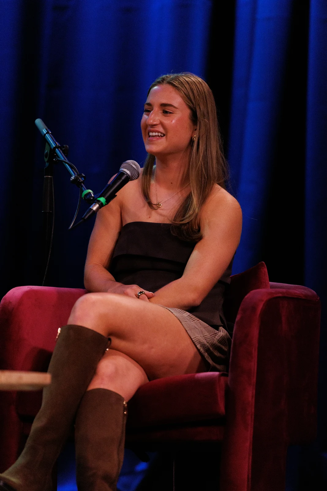 Ally speaking on stage